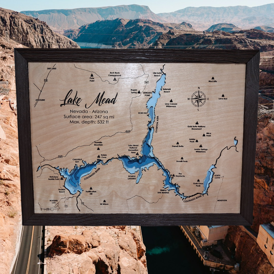 Lake Mead layered bathymetric wood map — Natural Baltic Birch, Charwood (Dark Brown), Hoover Dam scenic background (digital product mockup)
