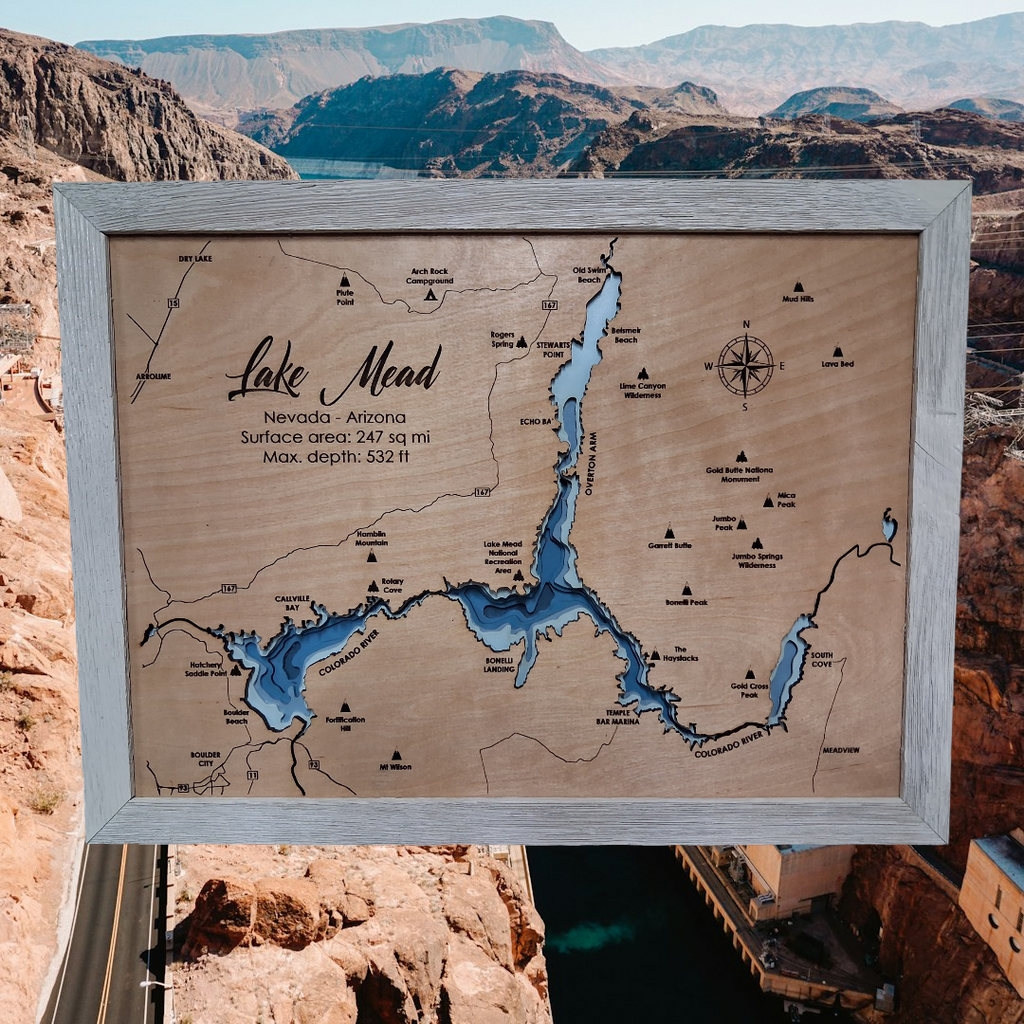 Lake Mead layered bathymetric wood map — Natural Baltic Birch, Coastal White, Hoover Dam scenic background (digital product mockup)